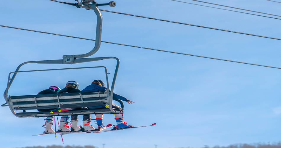 Skiers on lift