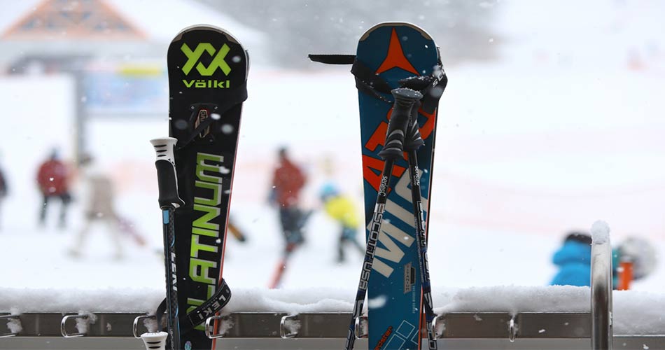 Skis propped on rail at Grand Targhee ski area.