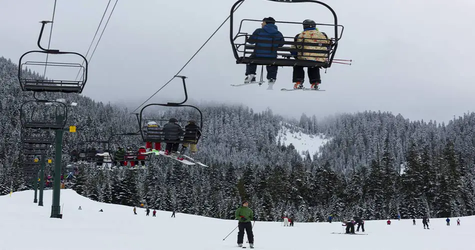 Crystal mountain skiers and snowboarders.