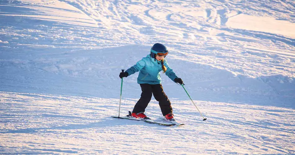 Child skiing Blue Hills Ski Area trails in Massachusetts.