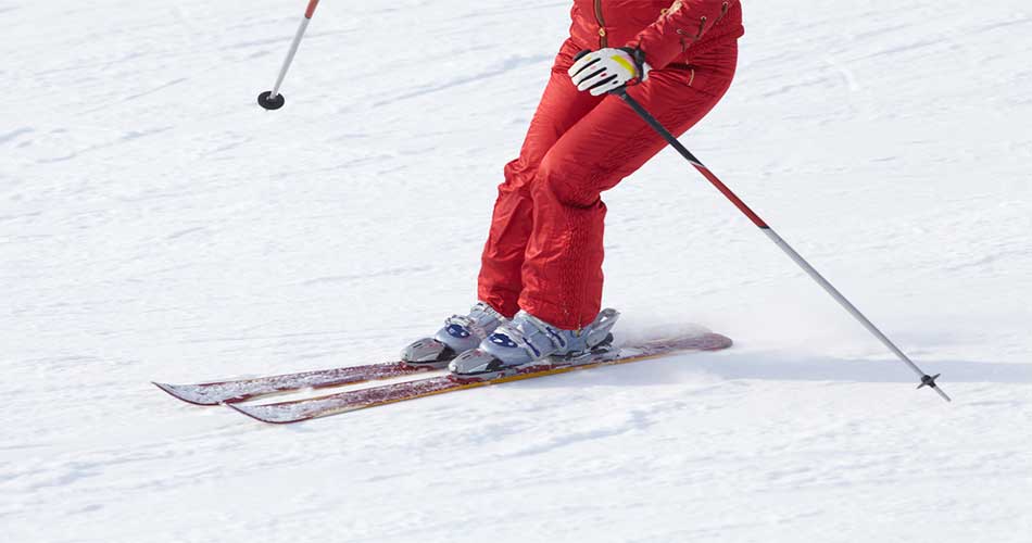 Downhill skier at Trollhaugen Outdoor Recreation Area.