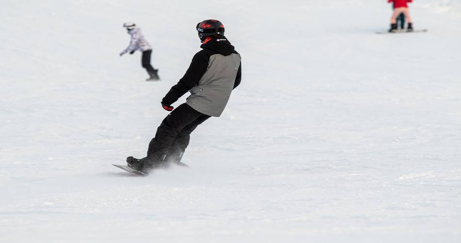 Snowboarding intermediate trails at Boyne.