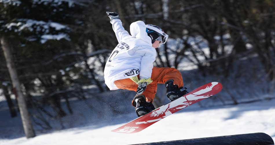 Snowboarder at Spirit Mountain Terrain Park.