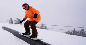 Snowboarder at Afton Alps terrain park.