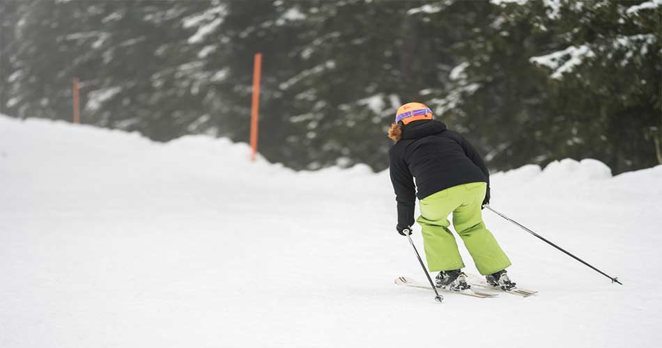 Beginner skier wearing a helmet