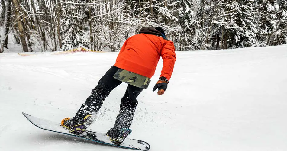 Buttering a snowboard