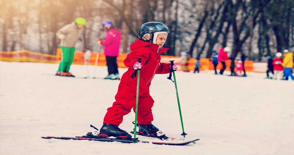 Child learning to ski at Sugarbush.