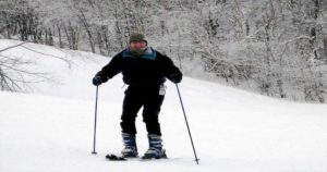 Happy skier on mount snow trails.