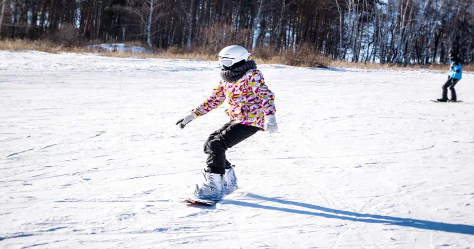 Practicing snowboard skills