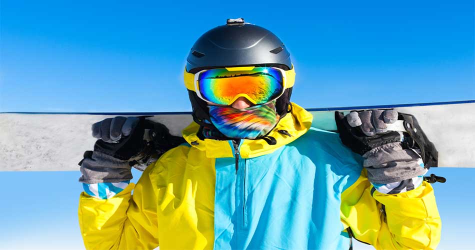 Snowboarder wearing bandana.