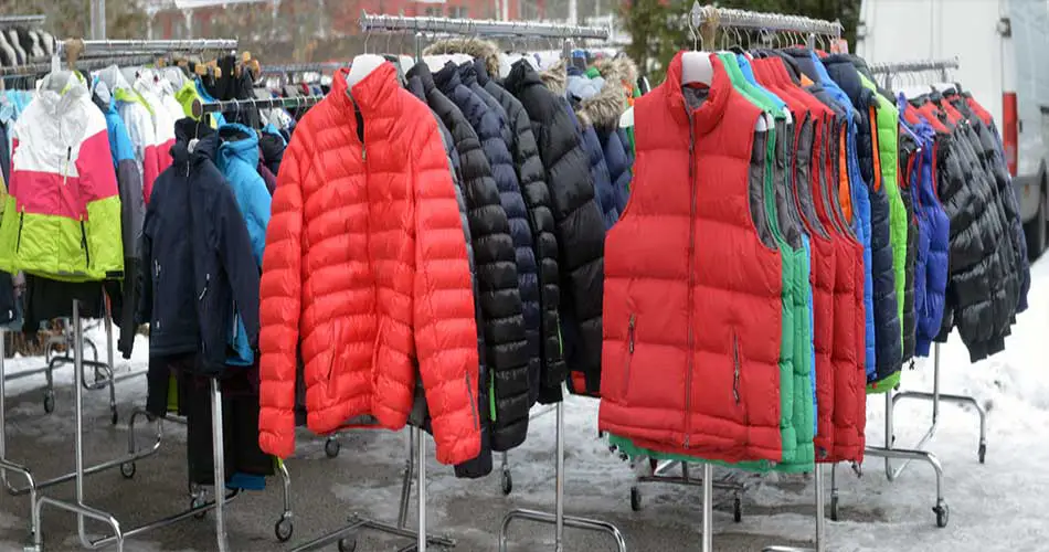 Snowboard jackets on rack.
