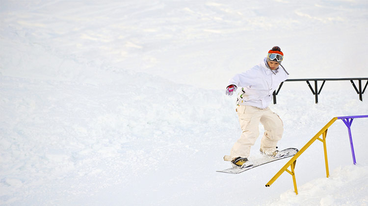 Snowboarder with wide snowboard