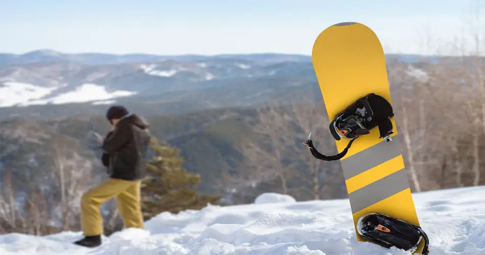 Wide snowboard on slopes