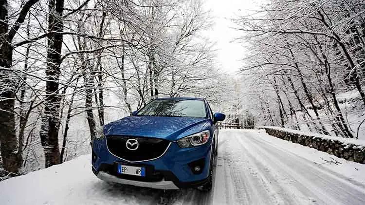 Mazda SUV in the snow.