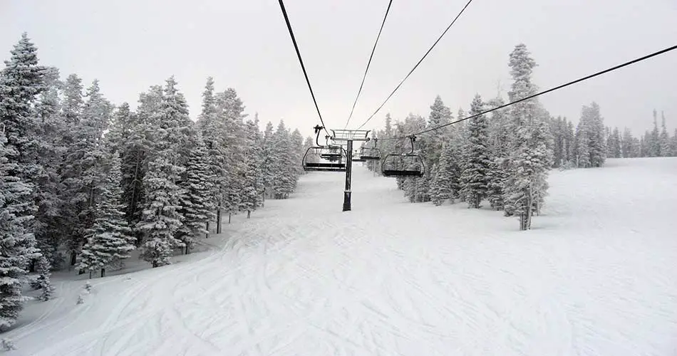 Riding the ski lifts at winter park