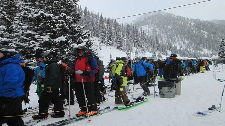 Crowded ski resort line.