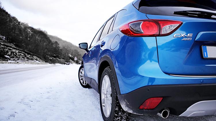 Mazda CX-5 in fresh snow.