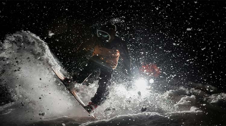 Snowboarder at Bear Creek, at night.