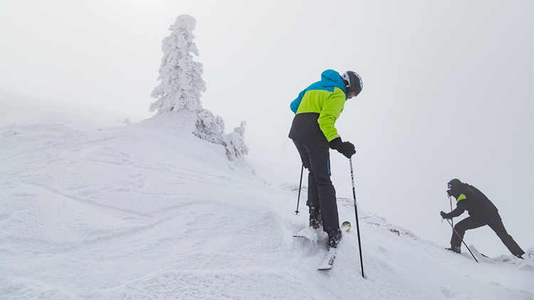 expert skier skiing hardest trail 