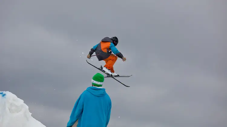 Skier using park skis for turns, speed and flex
