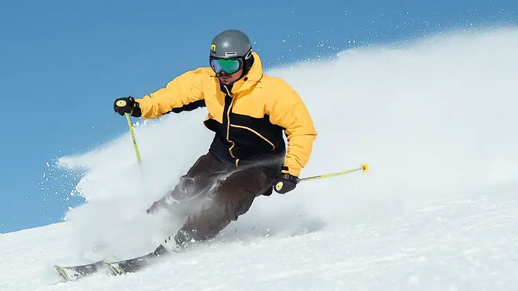 Skier gliding downhill