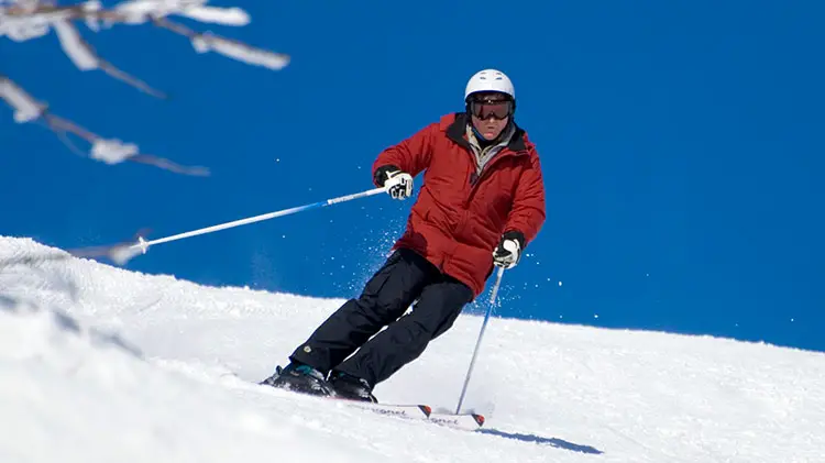 Downhill skiing on blue squares.