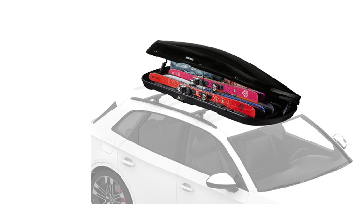 Yakima roofbox with skis.